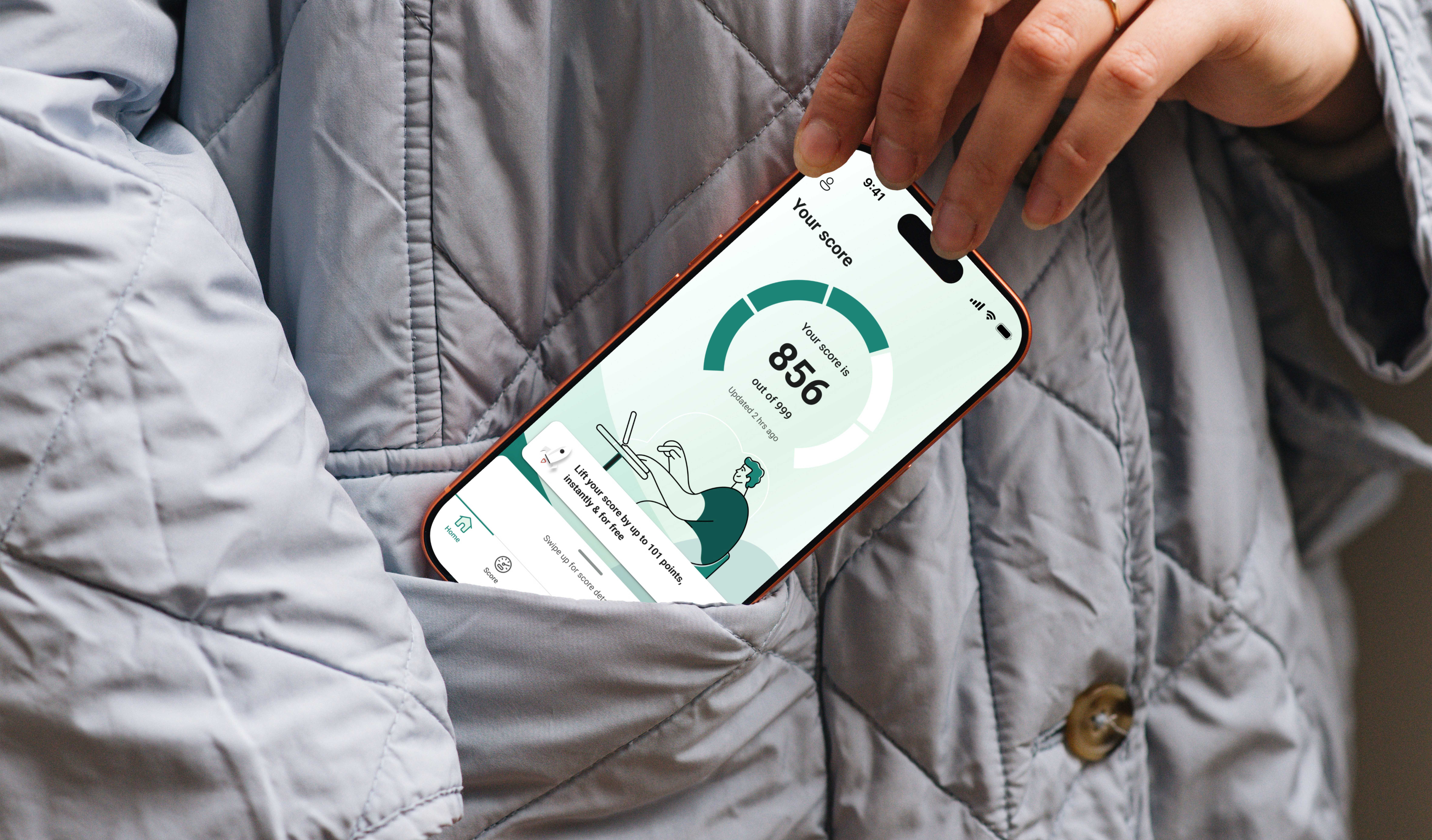Hand holding a phone showing the Credit Score app's score overview screen, displaying a score of 856 out of 999